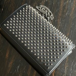 Christian Louboutin metal detailed clutch on chain in black colour